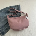Pink waffle texture crossbody bag in half-moon shape with cute cloud charm - Pink
