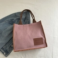 Borsa tote in velluto a coste rosa chiaro con manici marroni ed etichetta moda - Rosa