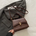 Deep brown retro leather shoulder bag with gold circular metal buckle and strap - Brown