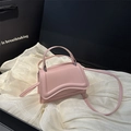Minimalist light pink crossbody square bag with wavy quilted edges and silver hardware - Pink