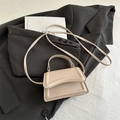Minimalist beige crossbody square bag with top handle and decorative stitching - Khaki