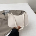 Chic white pebble leather baguette shoulder bag for women with silver metal hardware - White