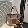 Gray nylon tote bag with brown leather straps and a cute plush bear pendant accessory - Small / With Pendant / Dark Gray