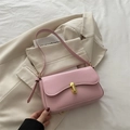Minimalist soft pink leather baguette bag with premium gold metal clasp and long strap - Pink