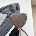 Minimalist heart-shaped crossbody bag in dark grey crocodile texture with silver chains - Gray