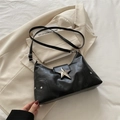 Solid black faux leather shoulder bag with silver star rivets and metallic buckle - Black