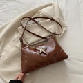 Vintage brown shoulder bag with large metal star and silver studs on soft faux leather - Brown