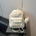 White quilted backpack with sequin bow embroidery and plush star charm accessory - With Pendant / Large / White