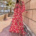 Close-up of V-neckline and drawstring waist on a floral print long sleeve maxi dress - Red Leopard Print (With Belt)