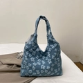 Blaue Tragetasche mit 3D-Blumenmustern und Doppelgriffen in modernem, schlichtem Design - Blau