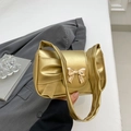 Chic metallic gold handbag with bow-shaped pleats and decorative metal bow buckle - Gold