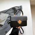Elegante borsa quadrata bicolore grigio e nero con chiusura floreale in metallo oro - Nero