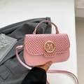 Chic pink square bag with woven flap detail and gold M buckle for versatile crossbody wear - Pink