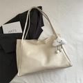 Chic cream leather tote bag with a whimsical fluffy cloud charm and long shoulder straps - Off White