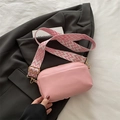 Pink crossbody bag with geometric wide fabric strap and golden metal hardware detail - Pink