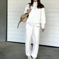 Completo sportivo bianco da donna con felpa a mezza zip e pantaloni larghi casual - S / Bianco