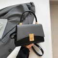 Gray herringbone patterned flap handbag with black leather and golden turn-lock closure - Black