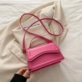 Fuchsia square crossbody bag with wavy stitching and adjustable shoulder strap - Pink
