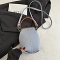 Light blue denim bucket bag with vintage clasp closure and brown leather top handle - Gray