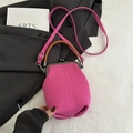 Pink vintage textured crossbody bag with brown leather handle and silver metal clasp - Rose Red