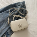 Cream white crossbody bag with rhinestone star buckle on textured fabric with chain strap - White