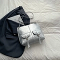 Retro silver metallic faux leather backpack with double buckle pockets and thin strap - Silver