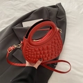 Chic red faux leather crossbody bag with square embossed pattern and gold hardware - Red