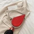 Elegant red teardrop evening bag featuring a crystal-encrusted silver ring handle - Red