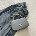 Light blue crossbody bag with rhinestone star detail and silver chain strap - Blue