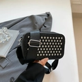 Black rectangular camera bag with silver rivets and wide nylon shoulder strap - Black