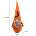 Halloween gnome plush with orange polka dot body and black bat wing details - Bat Hat Style