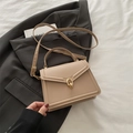 Elegant apricot crossbody bag with gold double-ring buckle and adjustable strap - Khaki