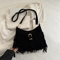 Chic black tassel shoulder bag with matte finish and gold hardware for 2025 fashion - Black