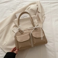 Beige multi-pocket shoulder bag with delicate white lace bows and sleek matte finish - Khaki