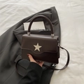 Dark chocolate square crossbody bag with silver star ornament and sleek leather finish - Brown