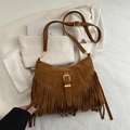 Caramel brown fringe shoulder bag in matte suede with golden buckle and adjustable strap - Tan