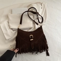 Dark brown suede crossbody bag with retro fringe detail and golden buckle accents - Brown