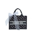 Borsa tote trapuntata nera con fiocchi bianchi e scritta Fashion Bag centrale - Nero
