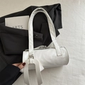 Chic white leather barrel shoulder bag with metal buckle and twin long straps - White