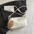 White half-moon crossbody bag with woven rope strap and cute brown bear charm - White With Pendant