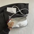 Silver metallic dumpling shoulder bag with cute brown bear charm and leather texture - Silver with Charm