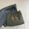 Olive green nylon tote bag with orange text print and functional drawstring closure - Dark Green