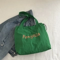 Green nylon Fanyissa tote bag with pink lettering and side drawstring closure - Light Green