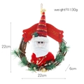 Christmas rattan wreath with Santa Claus doll and bells, 22cm festive door decoration - Santa Claus / S / Red