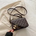 Dark brown square bag with quilted pattern, gold lock, and adjustable shoulder strap - Brown