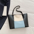 Bolso tote tricolor en negro, blanco y azul cielo con correas de cuero ajustables - Azul