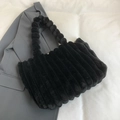 Furry black tote bag with plush bubble handles and textured stripe faux fur pattern - Black