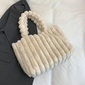Chic beige plush tote bag with vertical striped texture and fuzzy pom-pom handle - Khaki