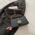 Chic black baguette bag with grey M monogram print and gold hardware buckle - Black