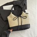Straw and black leather tote bag with bow detail and woven V-pattern texture - Black